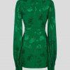 Reverse of green mini jacquard dress with balloon sleeves.